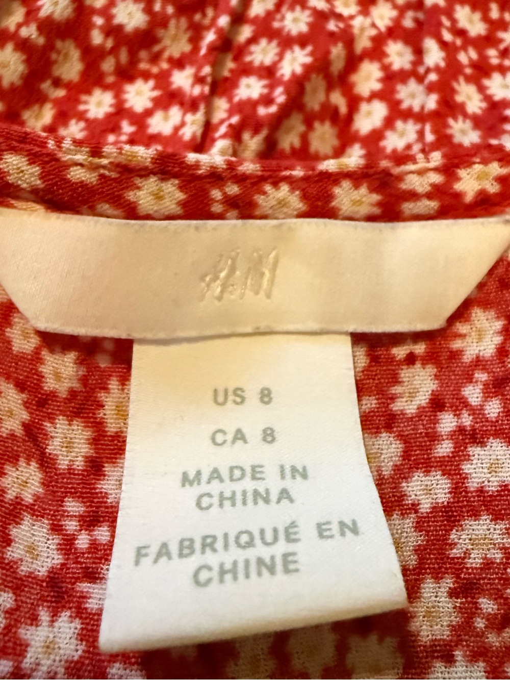 H&M Red And White Ditzy Floral Button-Front
Tie Detail Short Sleeve Mini Dress - Picture 3 of 6